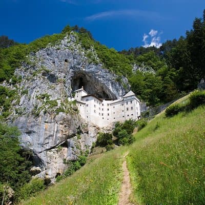 Postojna Cave & Predjama Castle from Trieste