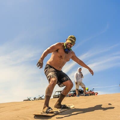 Sandboarding at the Mogote Dunes