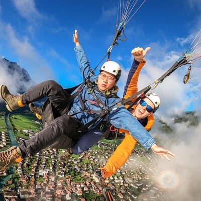 Tandem Paragliding Experience with Transport from Interlaken