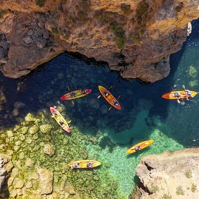 From Lagos: Kayak Tour of Ponta da Piedade Caves by Boat