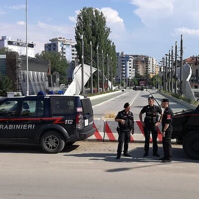 Mitrovica Day Tour from Peja Stories Borders and a Shot of Raki