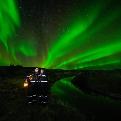Northern Lights Small-Group Tour with Photos, Snacks & Snowsuits