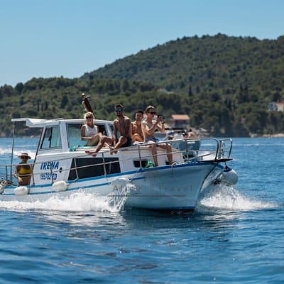 Visit 2 Islands of Zadar on a traditional wooden boat during half-day trip