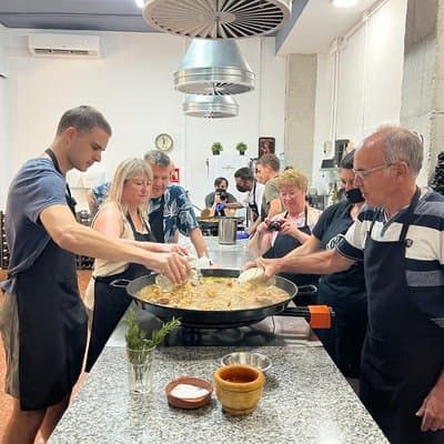 Seafood Paella cooking class Sangria workshop & Local Market